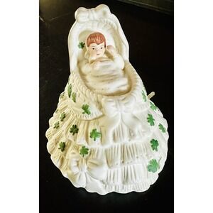VINTAGE LEFTON SHAMROCK BABY IN CRADLE ST PATRICKS DAY MUSICAL FIGURINE